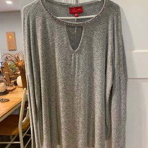 Jennifer Lopez grey long sleeve sweater